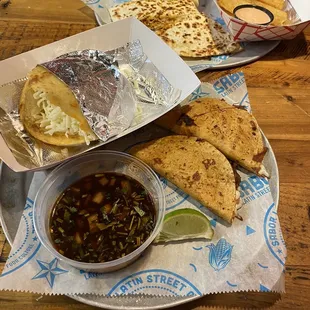 Arepas, quesabirria, quesadilla, and yuca fries.