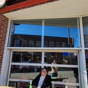 a woman sitting at a table