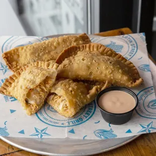 a plate of empanadas