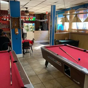 a pool table in a restaurant