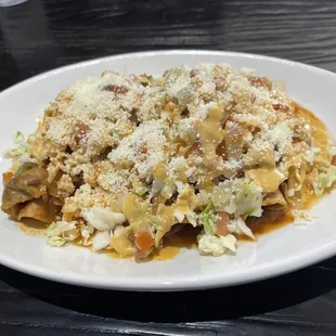a white plate of food on a table