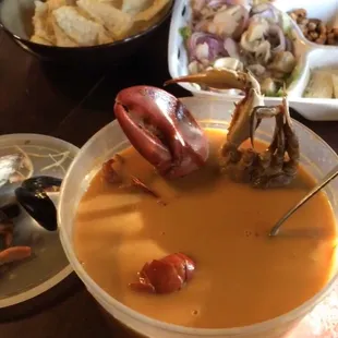 Mariscada Salvadorena Soup (cream, half lobster, whole blue crab, shrimp, mussels, clams, fish, &amp; tomatoes). Ceviche Mixto (chips not incl)