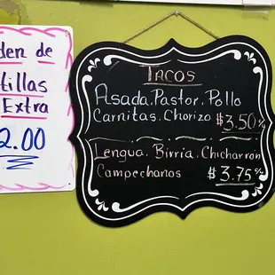 a menu and price sign