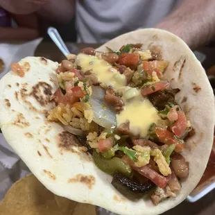 Steak, chicken and shrimp fajita