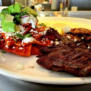 a plate of meat and vegetables