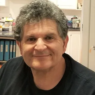 Mark E.