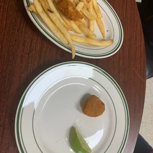 Kids chicken nuggets and fries split in two