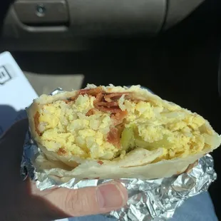 Breakfast burrito- bacon, egg, potatoes, cheese- Que  Rico!!!!