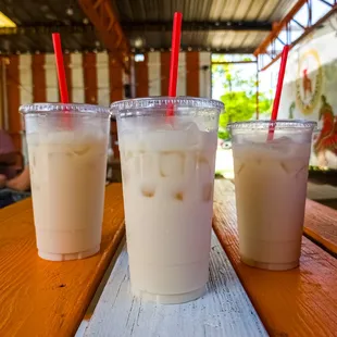 three drinks on a table