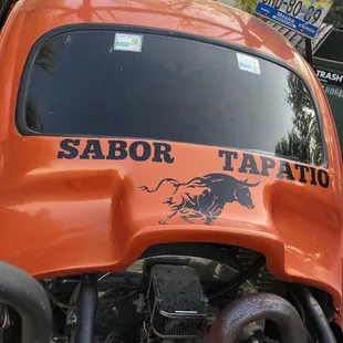 Not only an amazing food truck - they have this incredible car parked there too!