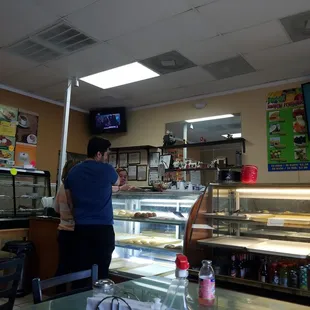 a man standing in front of the counter