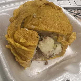 Papá rellena. The coating was mushy and gummy. If you are familiar with papa rellena, it&apos;s supposed to be breaded and fried like a croqueta