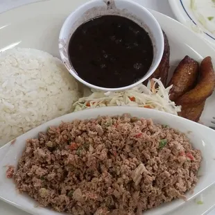 Salpicon with white rice and black beans and maduros.