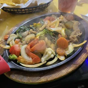 Part 2 of a vegetarian fajita dinner.  See the steam rising from the plate.