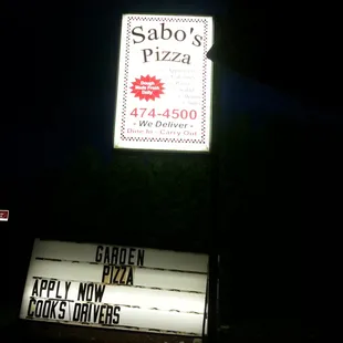 a sign for sabo's pizza