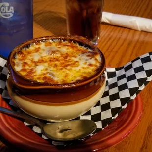 a bowl of soup and a spoon