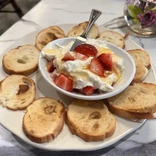 Goat Cheese Dip topped with fresh strawberries. Drizzled with your choice of honey or balsamic glaze. Both were delicious!