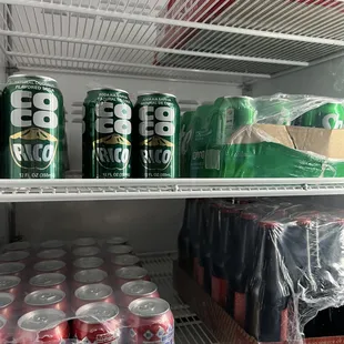 a refrigerator full of sodas