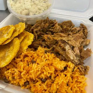 a meal in a styrofoam container