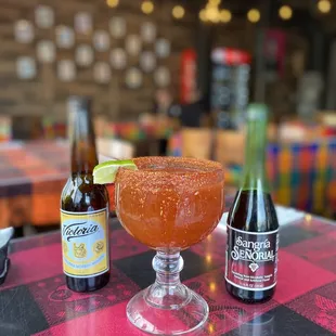 a margarita and a bottle of beer