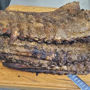 a pile of meat on a cutting board