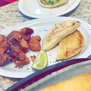 Chorizo, empanadas and arepas