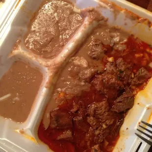 My lunch.   Mostly big chunks of fat, a little beef swimming in a pool of nasty grease.  Missing the salad.  Used to be great :(