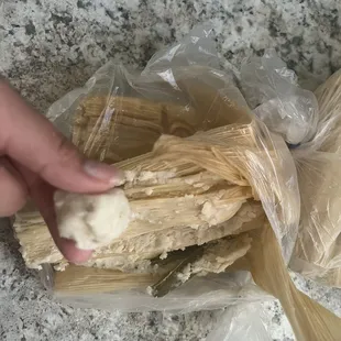 Proof of the tamales being RAW! So raw I could mold the masa in a ball. Proof with the receipt in the photos.