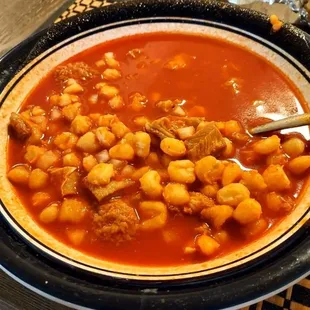 Very tomato-based sauce. Meat was cut in tiny pieces.  And this was a large