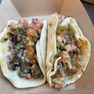Carne Asada taco and Carnitas taco