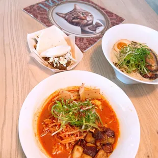 a bowl of soup and a bowl of noodles