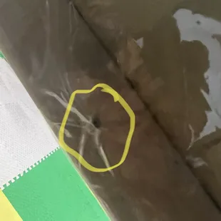 Screw with tape over it