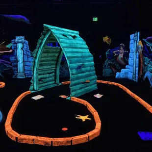 Come play our 18 hole black light pirate and mermaid theme mini golf  !