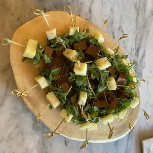 Arugula, Quince &amp; Manchego cheese skewers