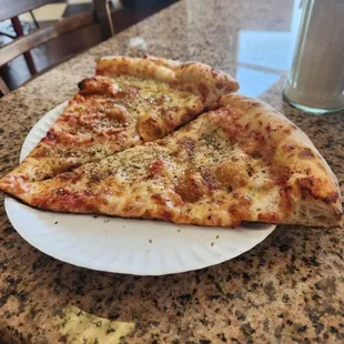Two Magnificent Saccone&apos;s Cheese Slices, the barometer of any good Pizzeria. Here Brooklynized with a lot of Oregano.