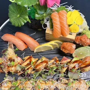 Sex on the Beach and Out of Control rolls with smoked salmon, spicy tuna and salmon sushi.  Yum!