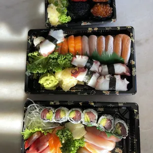 two trays of sushi