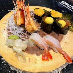 Uni, Ikura with Quail egg, and Sweet Shrimp.