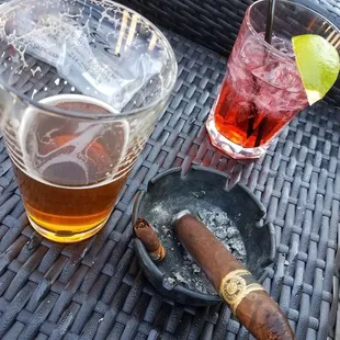 a cigar and a drink