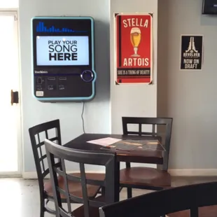 You can play your favorite song on the TouchTunes with your phone