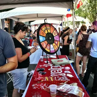 Lucy running the Prize Wheel