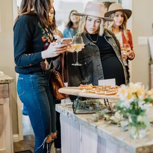 Guests enjoying the caprese crostini