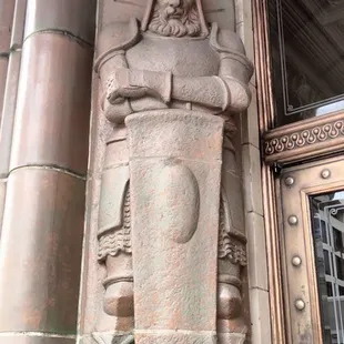 Entrance outside, he looks so sad....