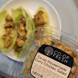 a plate of lettuce and chicken salad