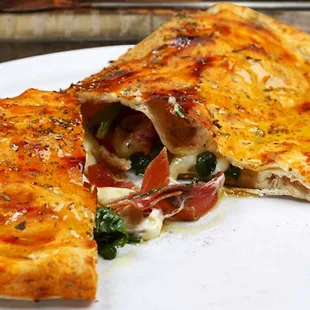 Calzone 2-top M $6.99, L $8.99, XL $10.99