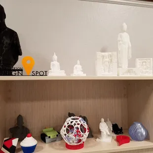 Toys and figures created in the 3-D print lab.