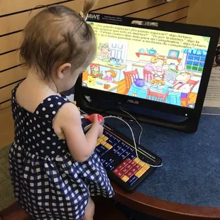 My 16 month old checking out one of the children's computers!