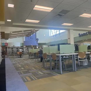 Plenty of computers, books and tables for your library needs.