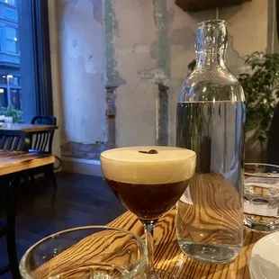 Espresso martini and exposed brick
