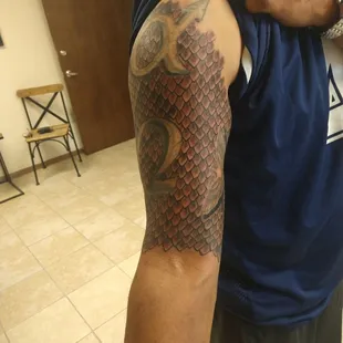 They did the snake scales. Took 11 hours of purely detail work!